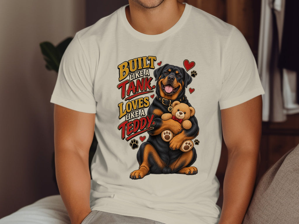 Rottweiler hugs teddy bear with text "Built Like a Tank Loves Like a Teddy".