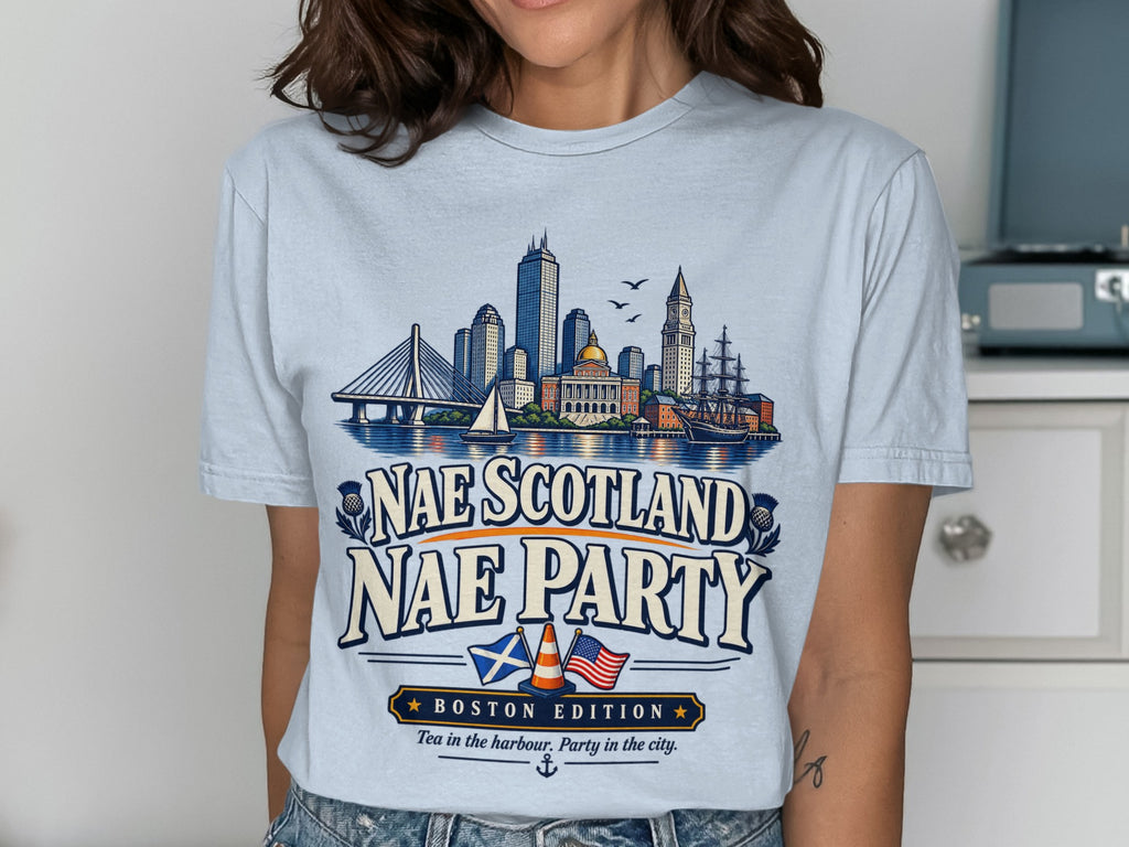 Light blue t-shirt with Boston skyline, ships, flags, and text "Nae Scotland Nae Party".