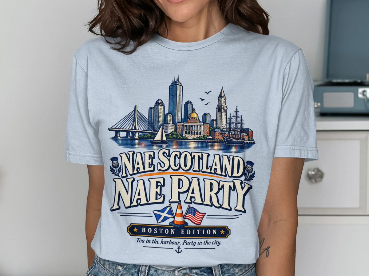 Light blue t-shirt with Boston skyline, ships, flags, and text "Nae Scotland Nae Party".