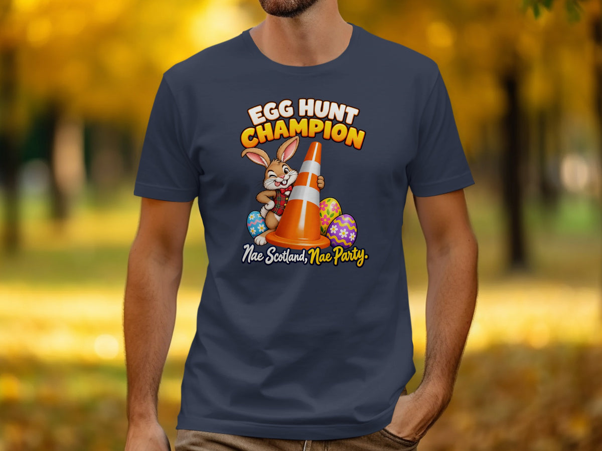 T-shirt graphic: bunny with cone, Easter eggs, "Egg Hunt Champion, Nae Scotland, Nae Party."