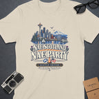 T-shirt graphic with Seattle skyline, text "Nae Scotland Nae Party".