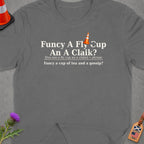 Grey t-shirt with text and a small orange traffic cone on top.