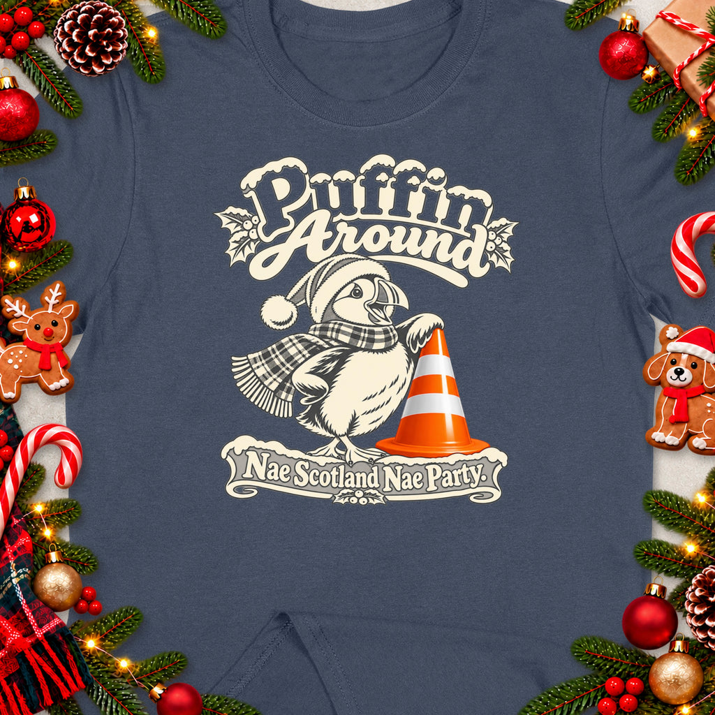 Puffin wearing Santa hat and scarf with traffic cone, "Puffin Around Nae Scotland Nae Party" text.
