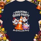 Three chicks, one in an eggshell, with an orange traffic cone and text "Cracking Good Party".