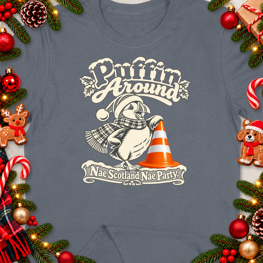 Puffin wearing a Santa hat and scarf, with text "Puffin Around Nae Scotland Nae Party".
