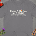 Grey t-shirt with text "Fancy A Fly Cup An A Claik?" and definition.
