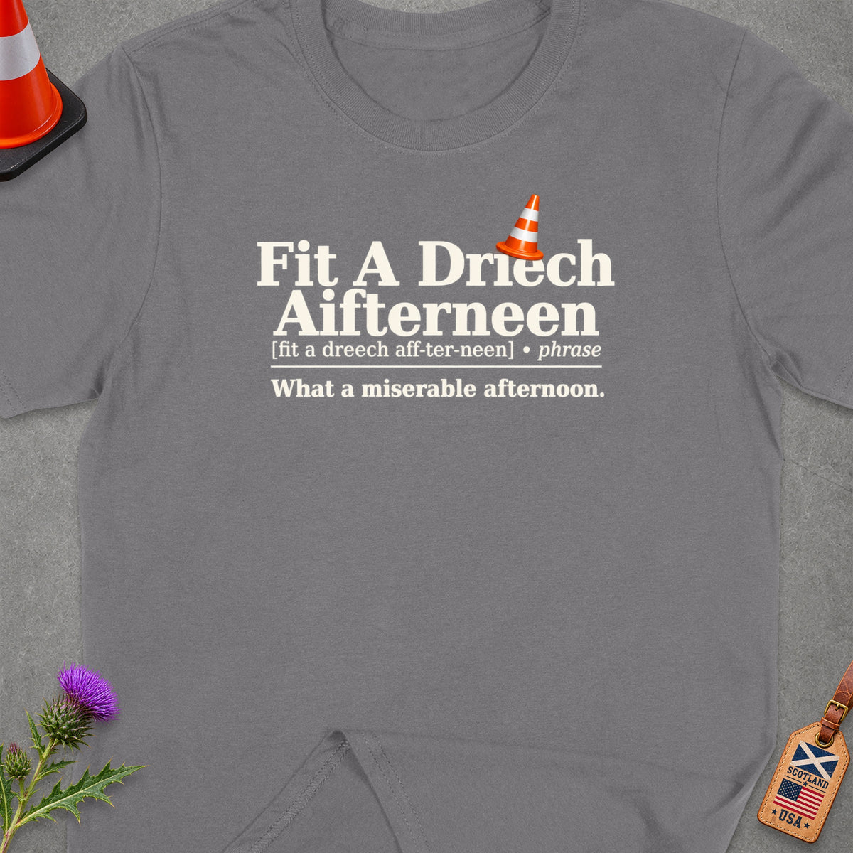 Grey t-shirt with "Fit A Driech Aifterneen" text and a traffic cone.