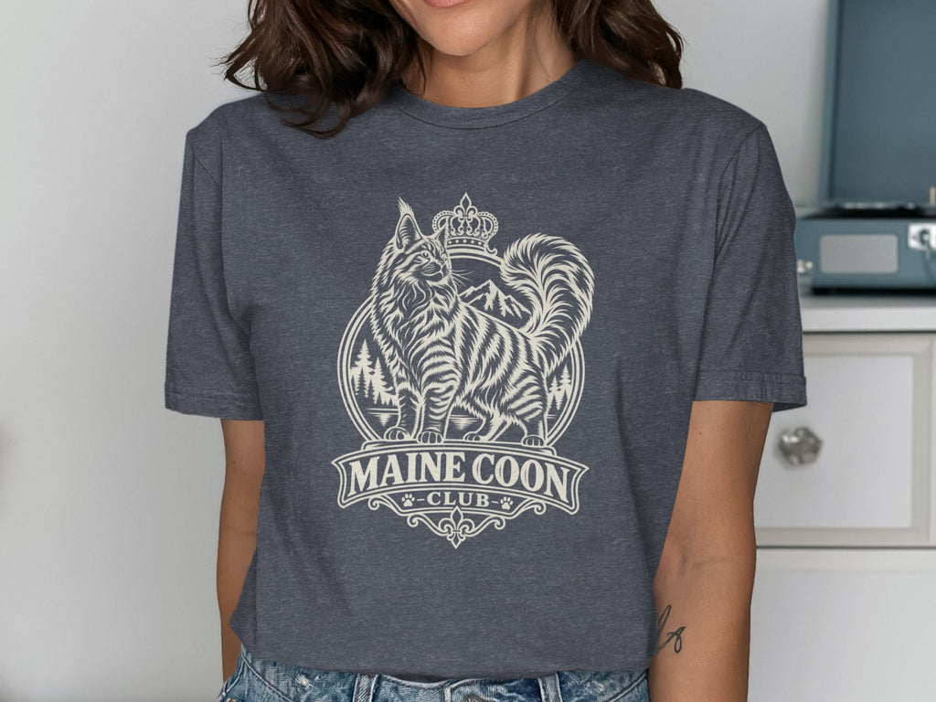 Maine Coon cat with crown and trees, "Maine Coon Club" text.
