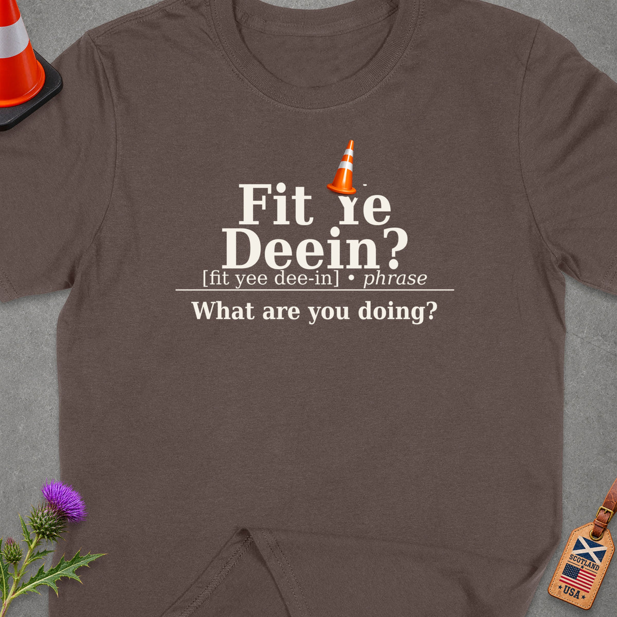 Brown t-shirt with "Fit re Deein?" text and traffic cone.