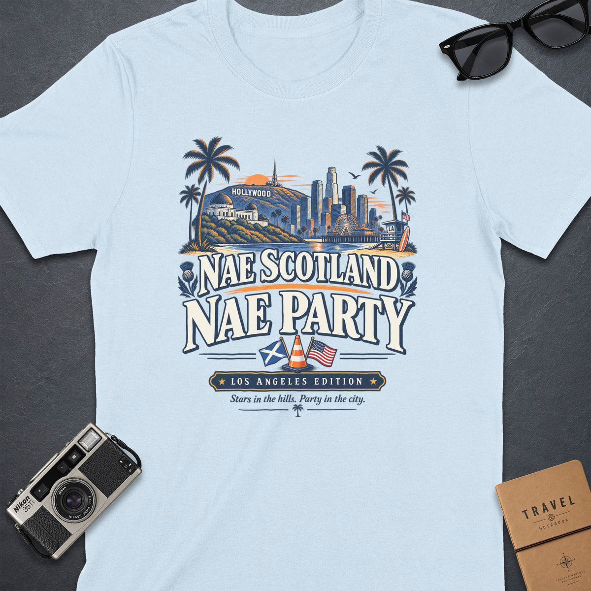 Light blue t-shirt with "Nae Scotland Nae Party" Los Angeles design.