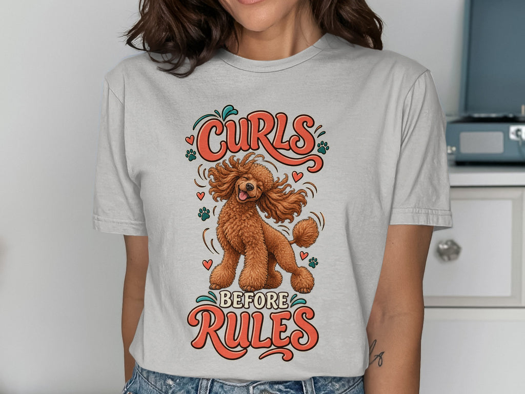 Light grey t-shirt with a graphic of a poodle and the text "Curls Before Rules".