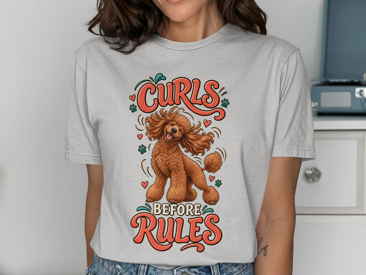 Light grey t-shirt with a graphic of a poodle and the text "Curls Before Rules".