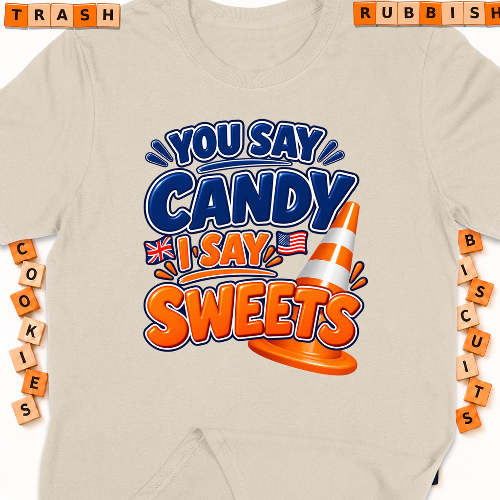 Graphic tee with "You Say Candy, I Say Sweets" text, traffic cone and flags.