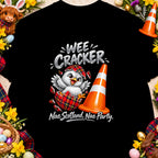 Fluffy chick hatching from tartan egg next to traffic cone with text "Wee Cracker" and "Nae Scotland, Nae Party."