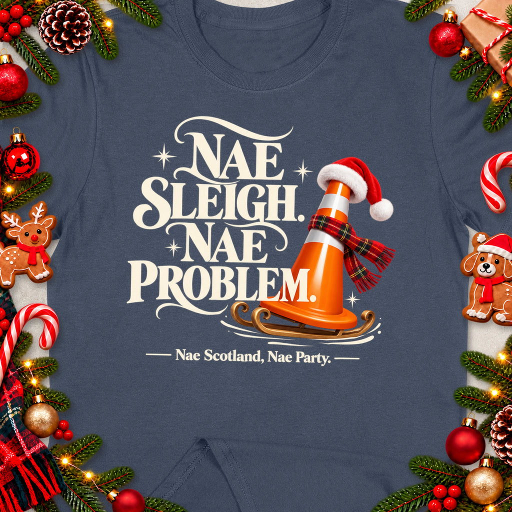 T-shirt with "Nae Sleigh. Nae Problem." text and Christmas decorations.