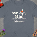 Grey t-shirt with text "Aye Aye, Min! Hello, mate!" and a traffic cone.