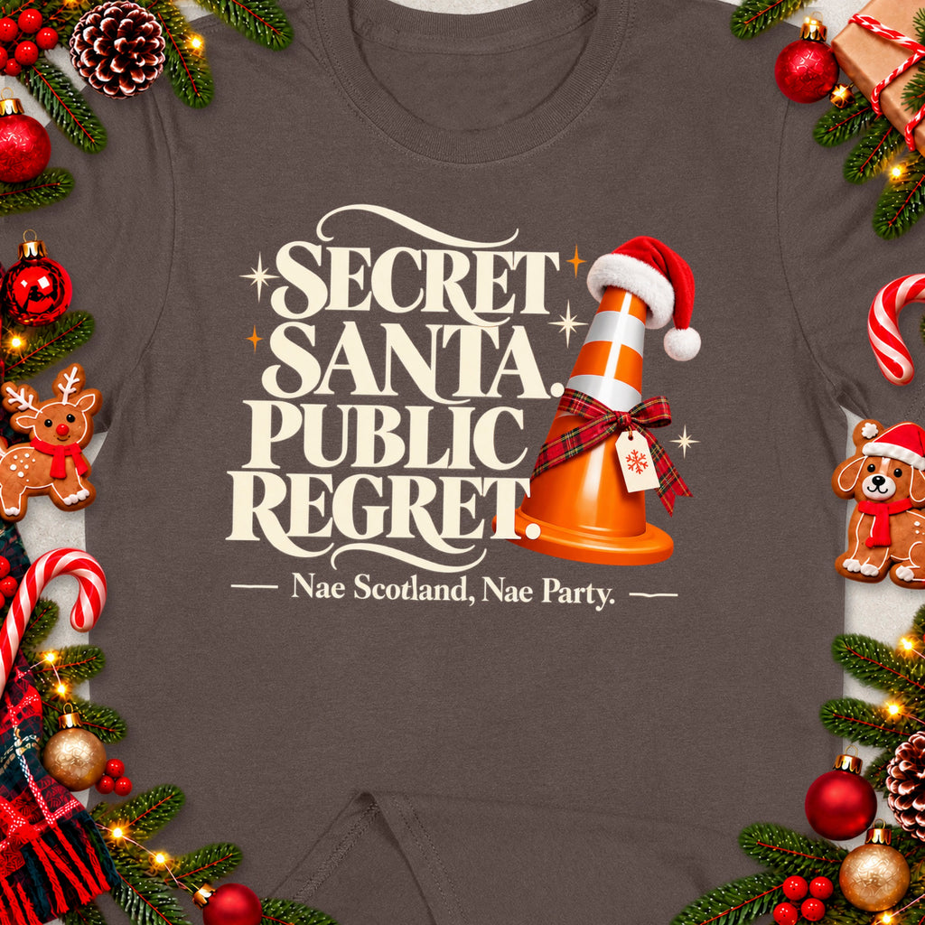 T-shirt with "Secret Santa Public Regret" text and a traffic cone.