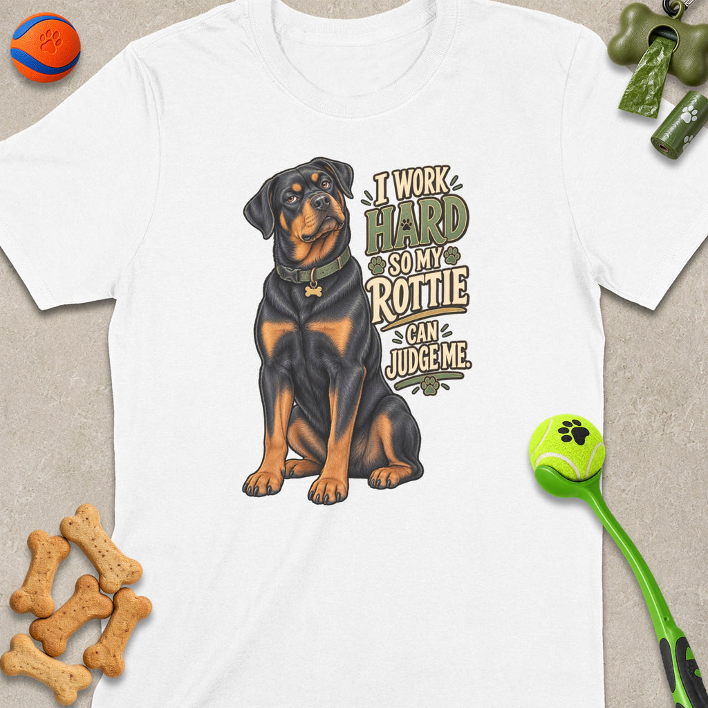 White t-shirt with Rottweiler graphic and text "I work hard so my Rottie can judge me."
