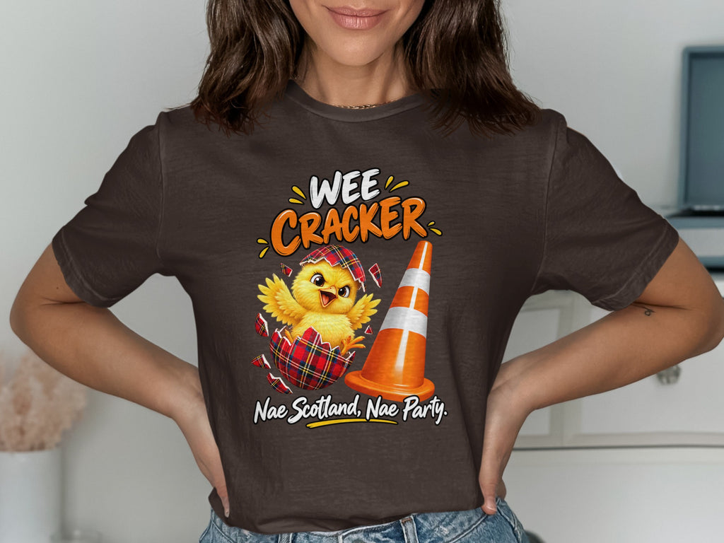 Chick hatching from egg with "Wee Cracker" and "Nae Scotland, Nae Party" text.
