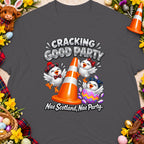 Three cartoon chicks celebrate around an orange traffic cone with "Cracking Good Party" text.