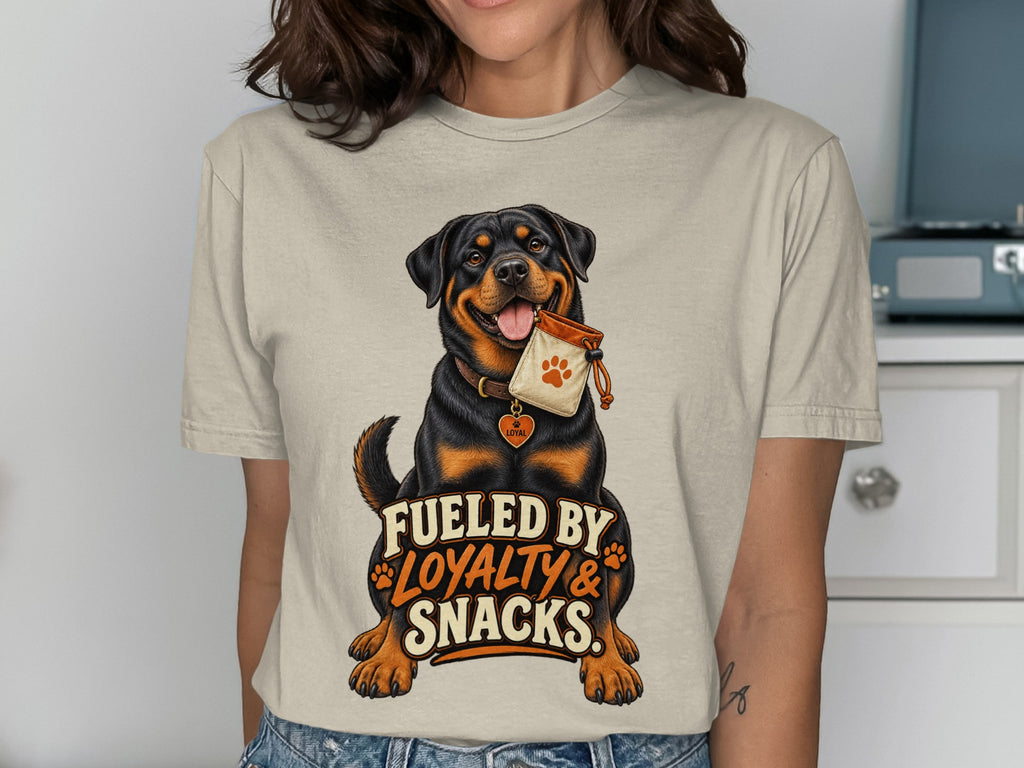 Rottweiler on t-shirt with "Fueled by Loyalty & Snacks" text.