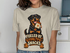 Rottweiler on t-shirt with "Fueled by Loyalty & Snacks" text.