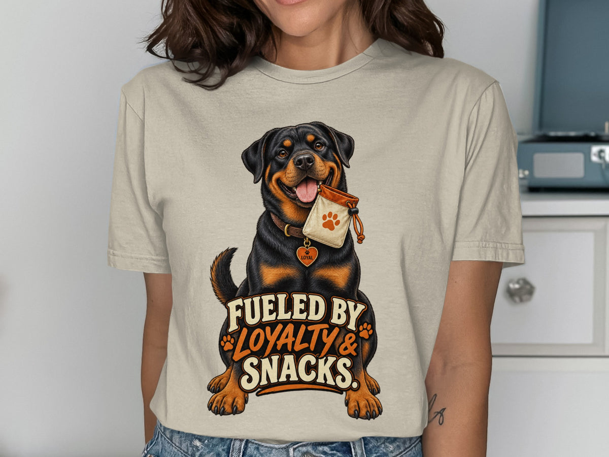Rottweiler on t-shirt with "Fueled by Loyalty & Snacks" text.