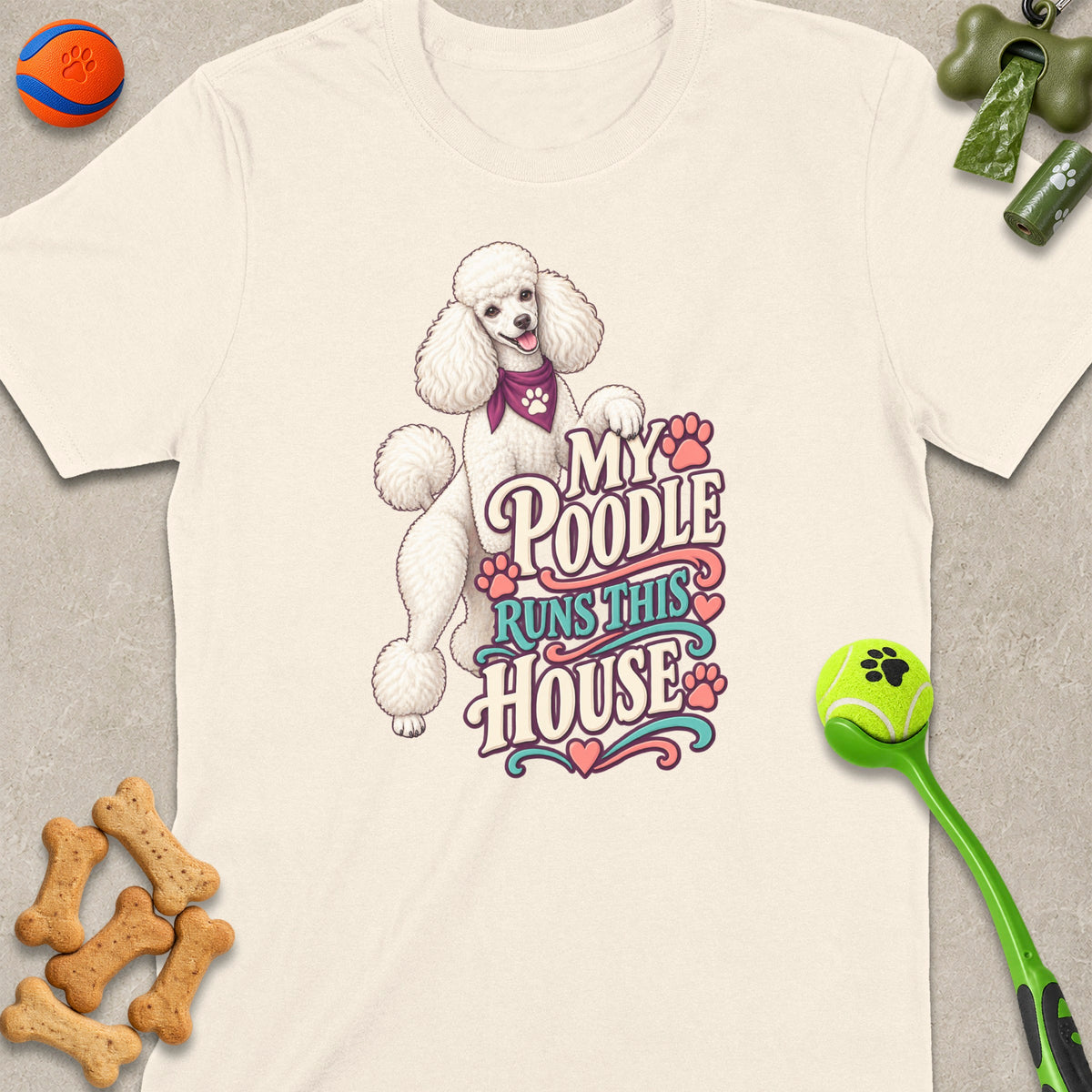 Cream t-shirt with illustration of a poodle and the text "MY POODLE RUNS THIS HOUSE".