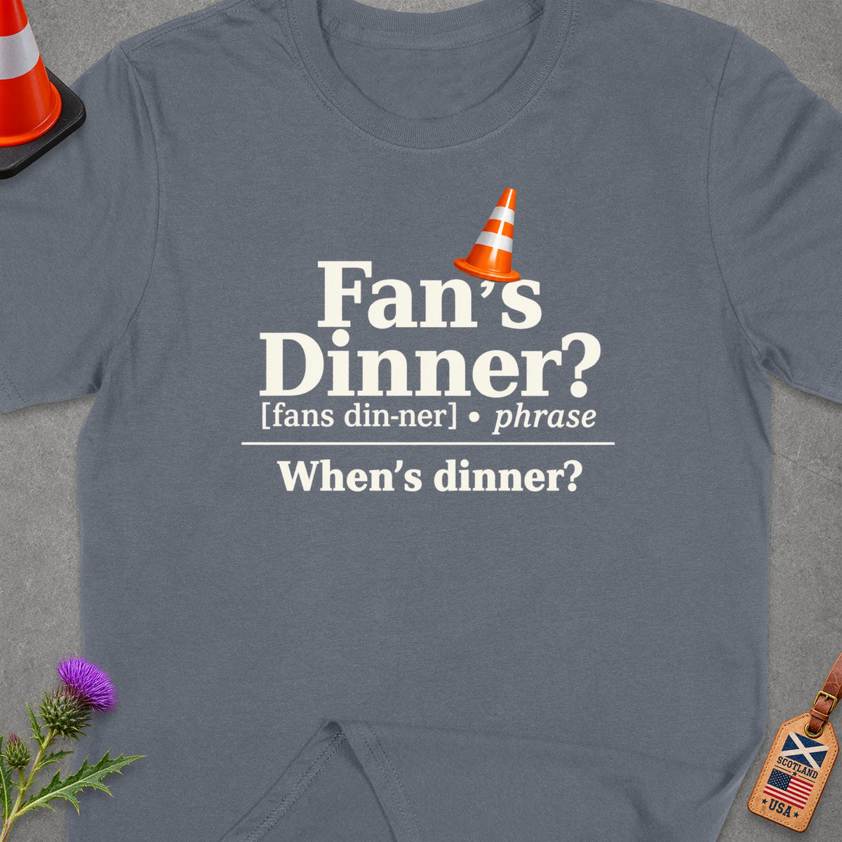 Grey t-shirt with white text: "Fan's Dinner? [fans din-ner] phrase When's dinner?".