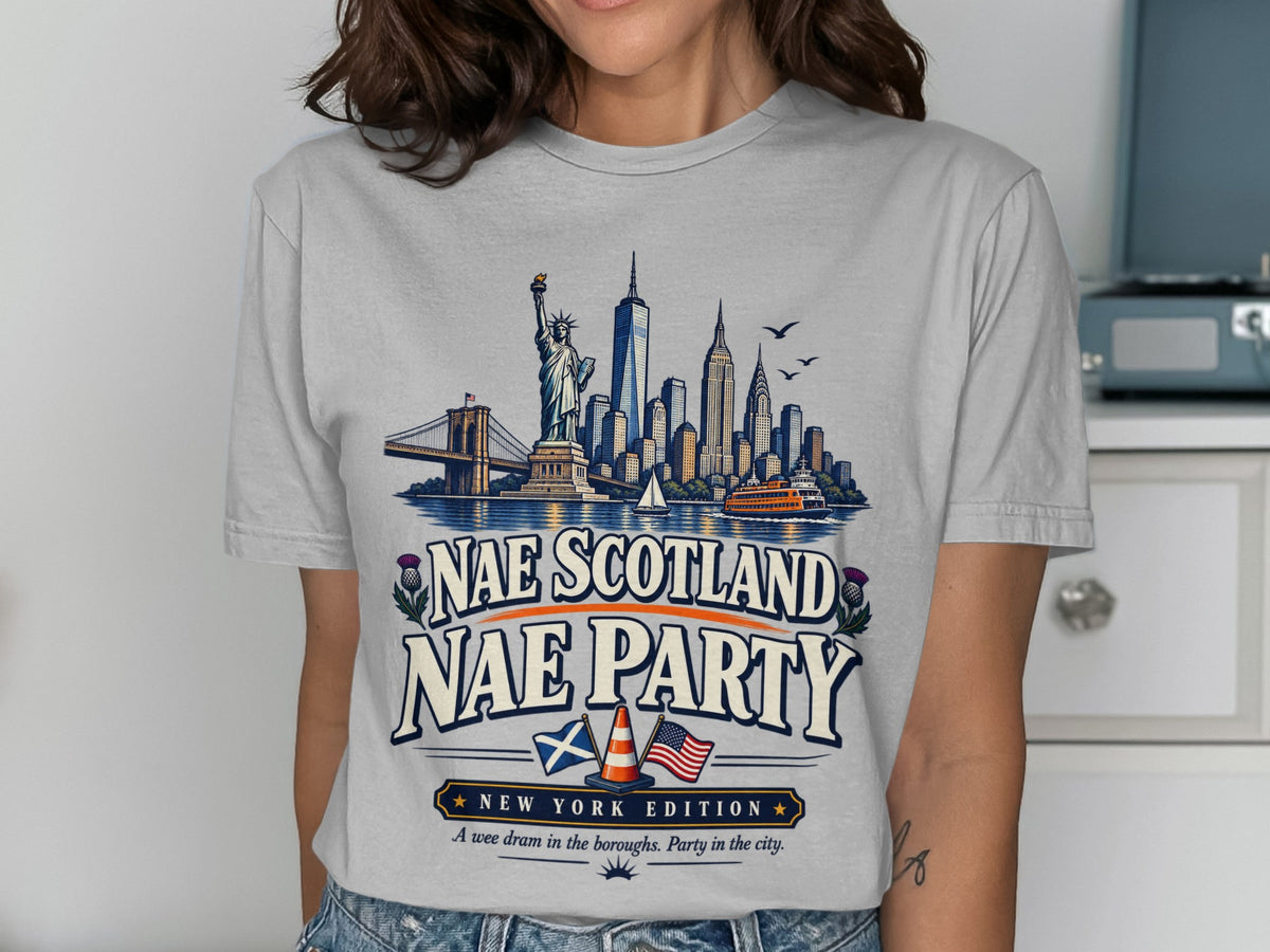 T-shirt graphic with New York skyline, Scottish and US flags, and "Nae Scotland Nae Party".