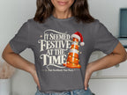 Dark gray t-shirt with "IT SEEMED FESTIVE AT THE TIME" and a traffic cone.
