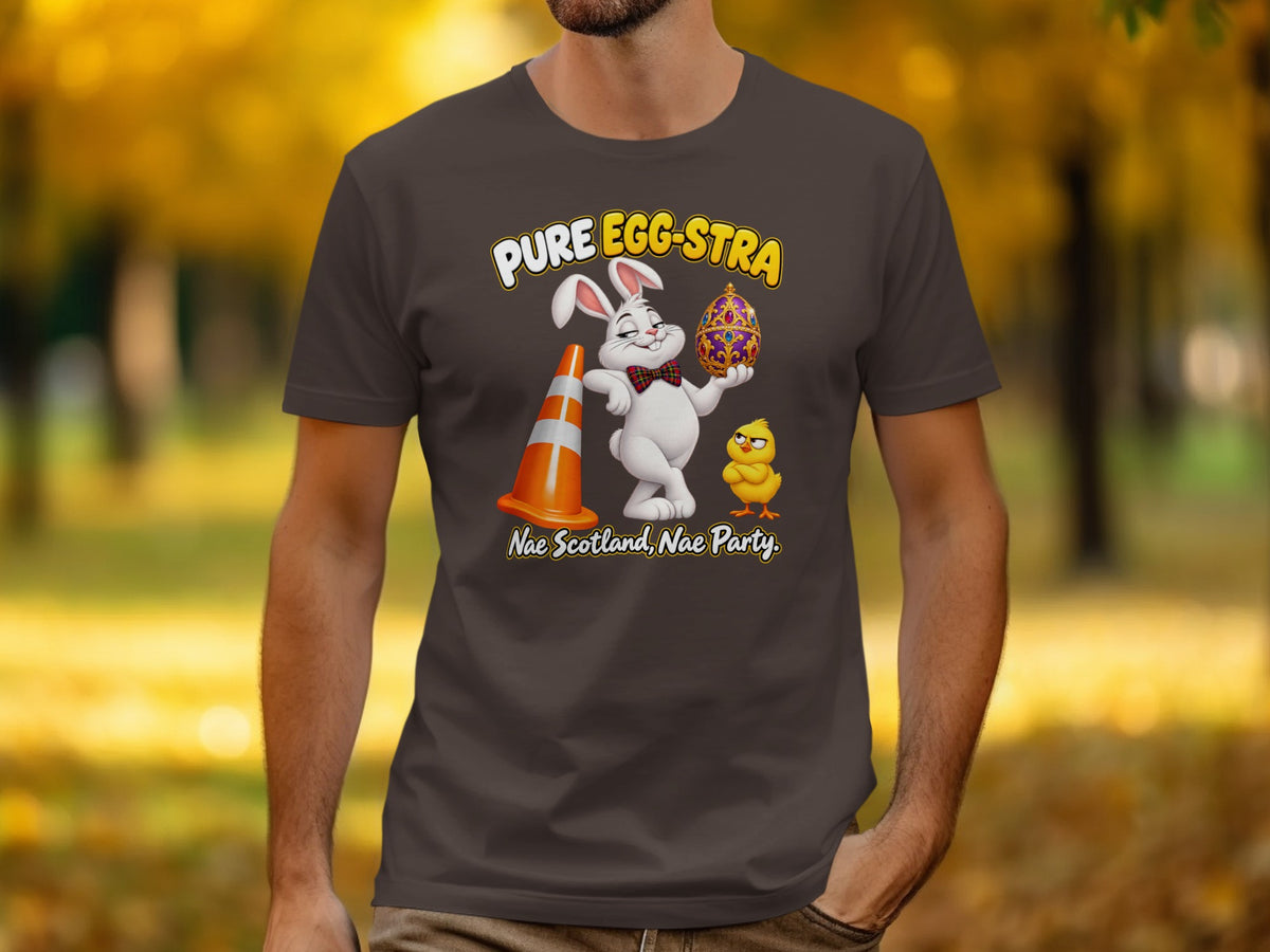 T-shirt graphic: rabbit holding ornate egg, chick, traffic cone, and text.