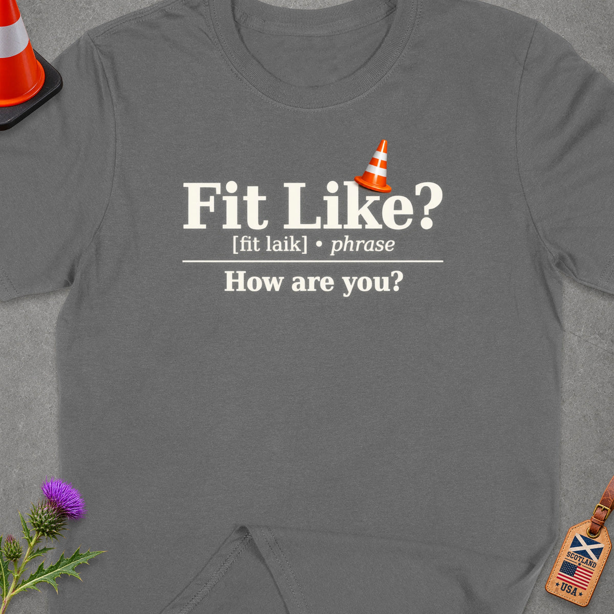 Gray t-shirt with "Fit Like? How are you?" text and orange traffic cone.