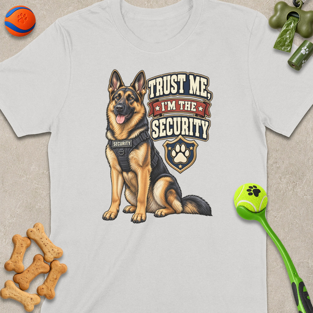 German Shepherd wearing a security vest with text "Trust Me, I'm The Security."