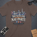 Brown t-shirt graphic with Washington D.C. landmarks, "Nae Scotland Nae Party," and flags.