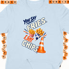T-shirt with "You Say Fries. I Say Chips." graphic and Scottish flag.