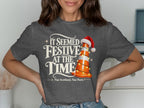 Grey t-shirt with text "It Seemed Festive At The Time" and a traffic cone.