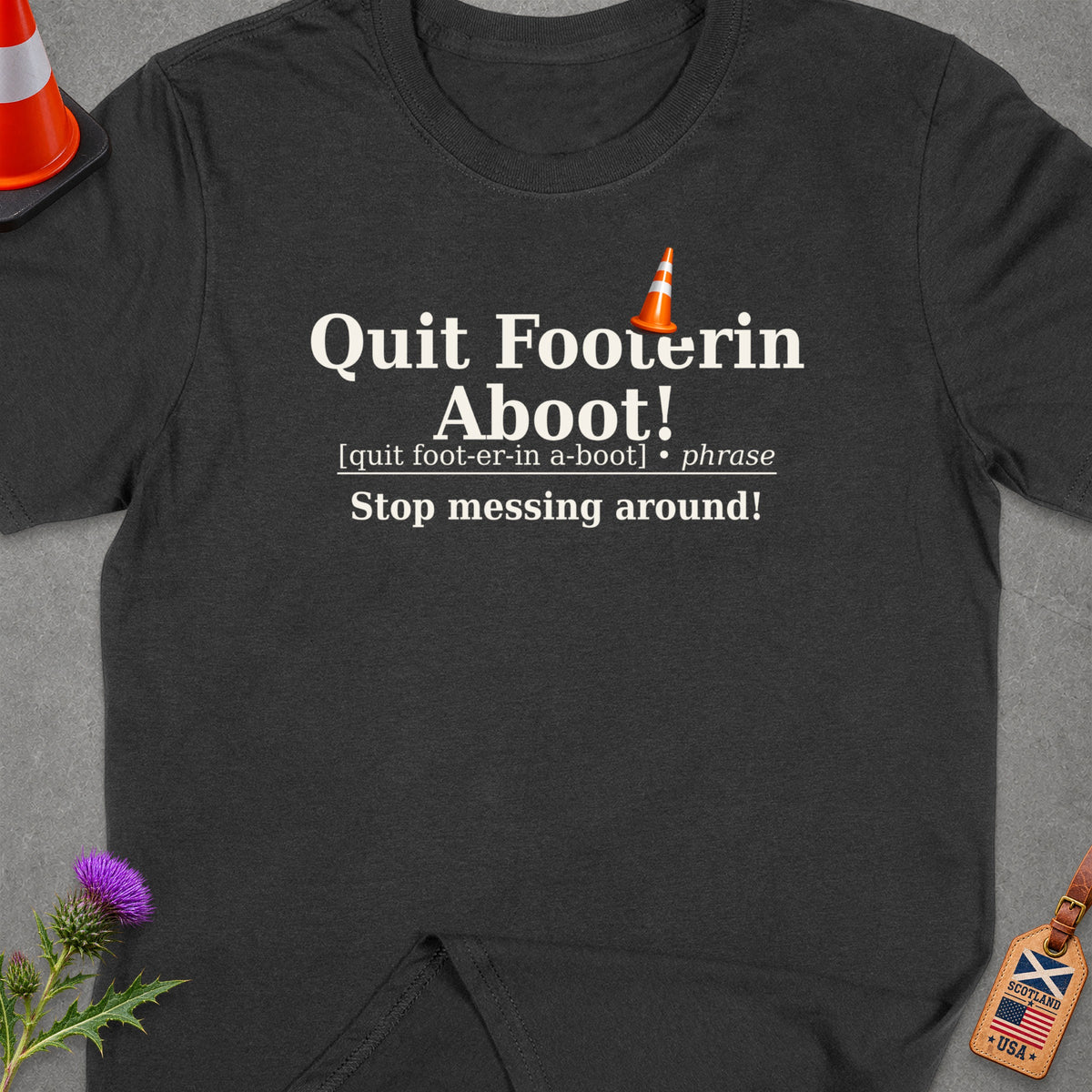 T-shirt with "Quit Footerin Aboot!" and definition.