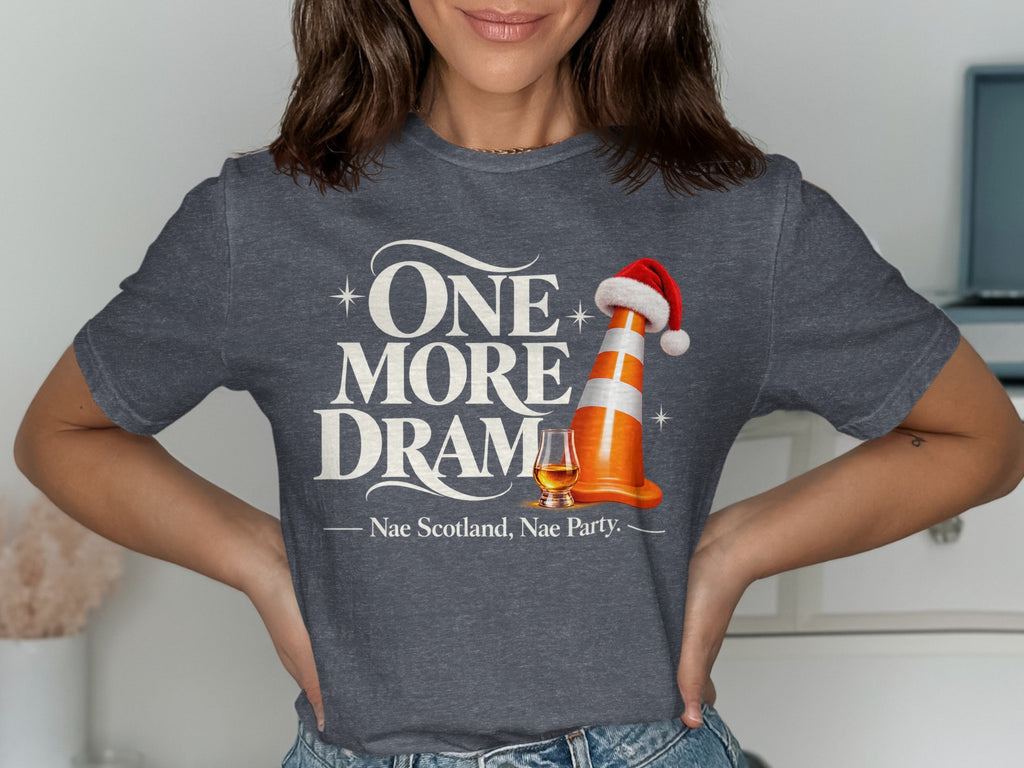 Dark gray t-shirt with "ONE MORE DRAMA" text, a traffic cone with Santa hat, and "Nae Scotland, Nae Party."