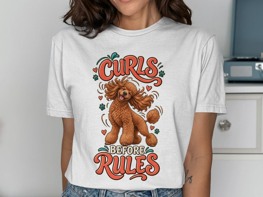 White t-shirt with a brown poodle and text that reads "Curls Before Rules".