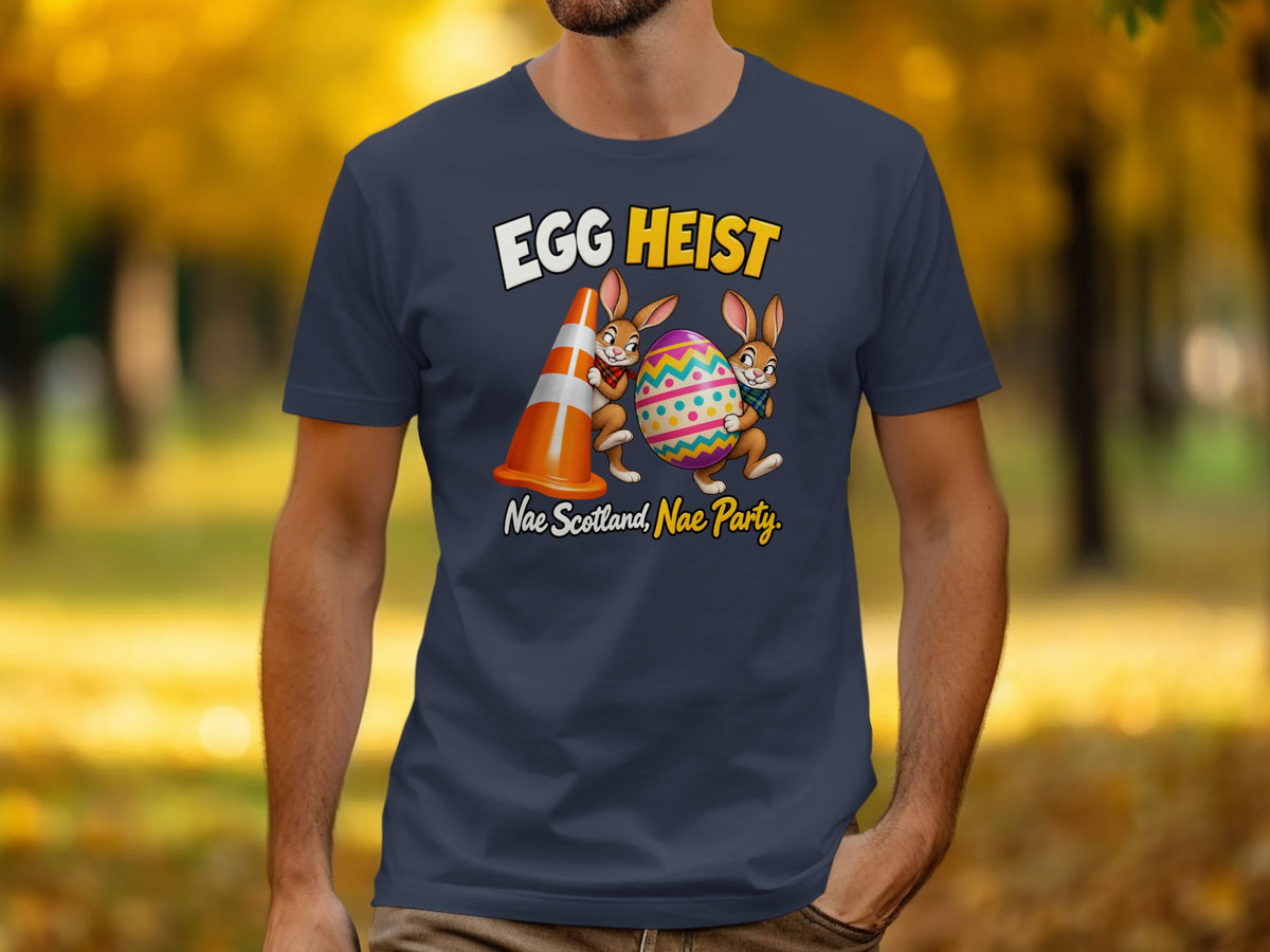 T-shirt with "Egg Heist" and two rabbits with an Easter egg and cone.