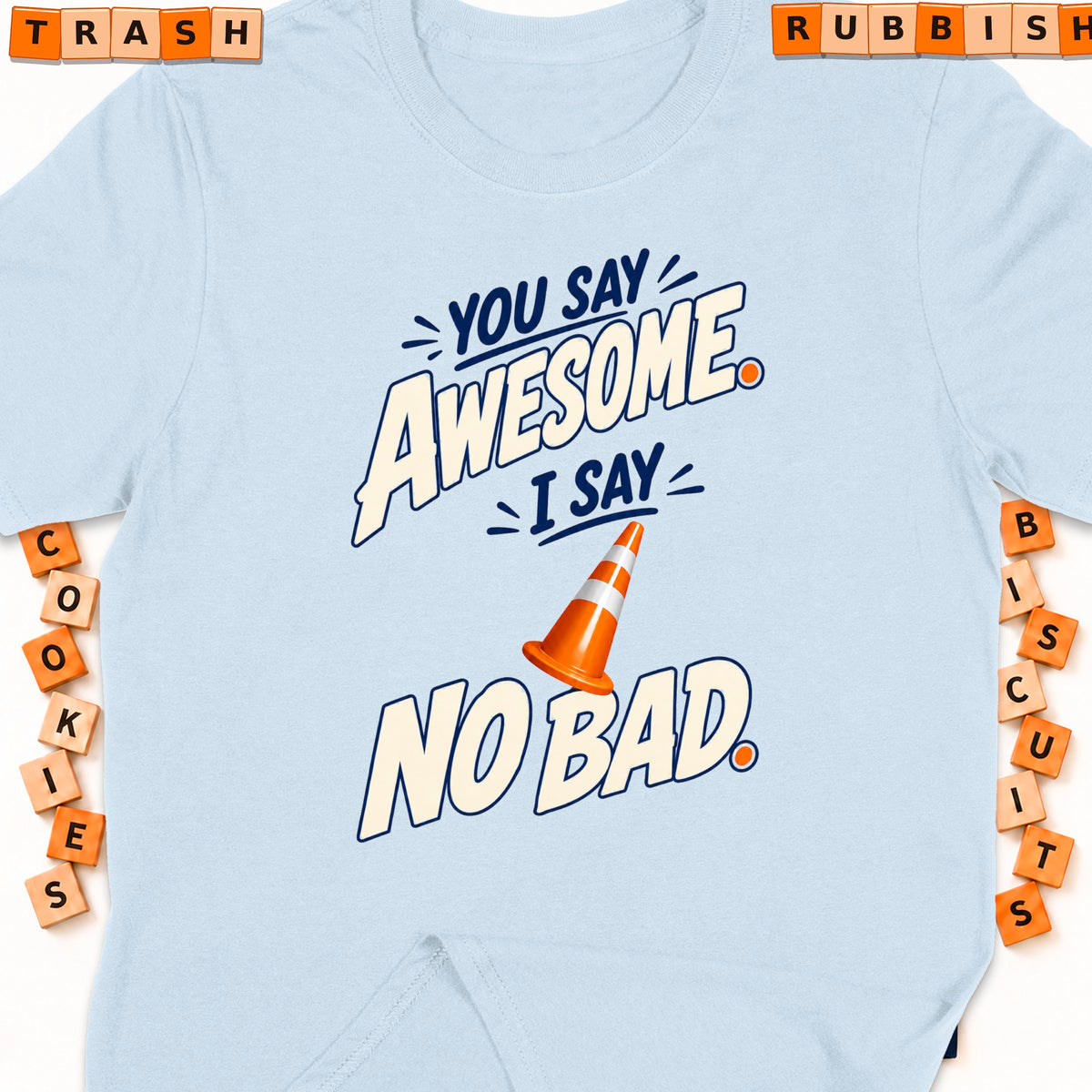 Light blue t-shirt with "You Say Awesome, I Say No Bad" graphic and traffic cone.