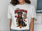 Rottweiler with keys and paw prints on a white t-shirt, text reads "MY ROTTWEILER RUNS THIS HOUSE."