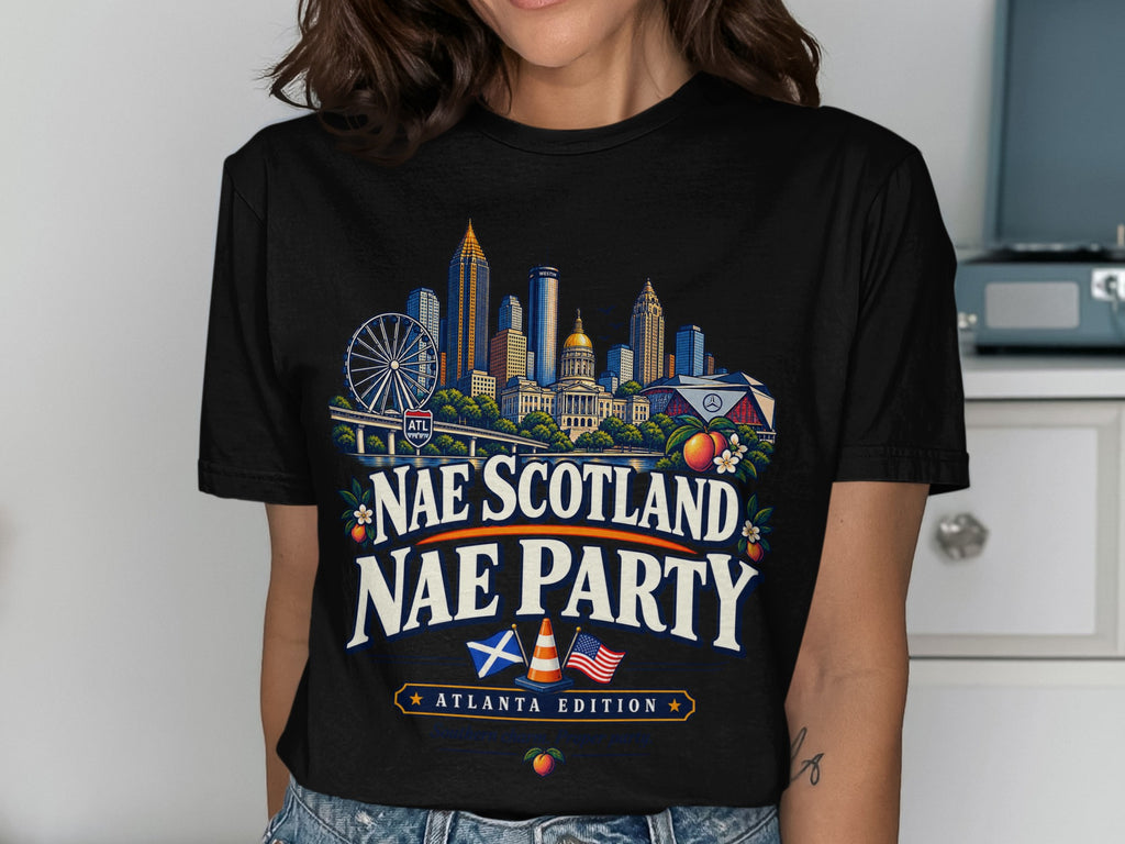Black t-shirt with Atlanta skyline, "Nae Scotland Nae Party" text, and flags.