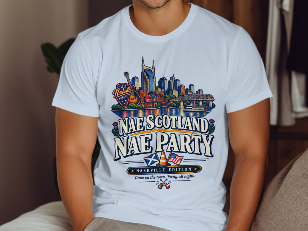 White t-shirt with Nashville skyline, guitar, and "Nae Scotland Nae Party Nashville Edition" text.
