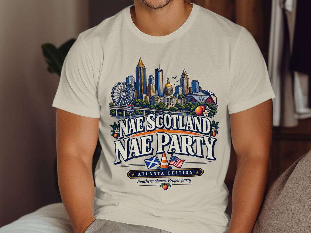 T-shirt graphic with Atlanta skyline, "Nae Scotland Nae Party," and "Atlanta Edition."