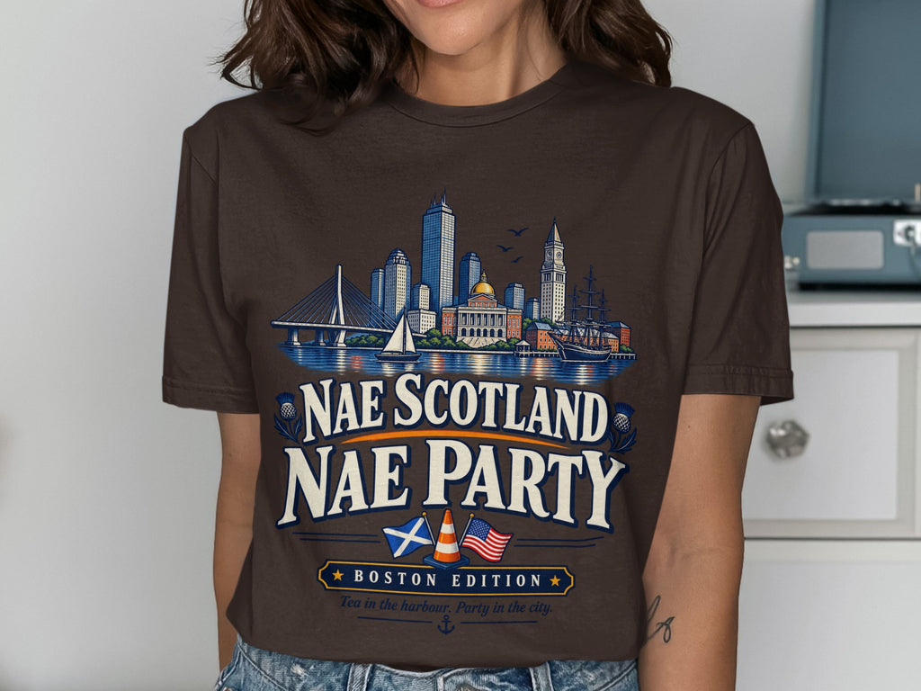 Brown t-shirt with Boston skyline graphic and "Nae Scotland Nae Party Boston Edition" text.