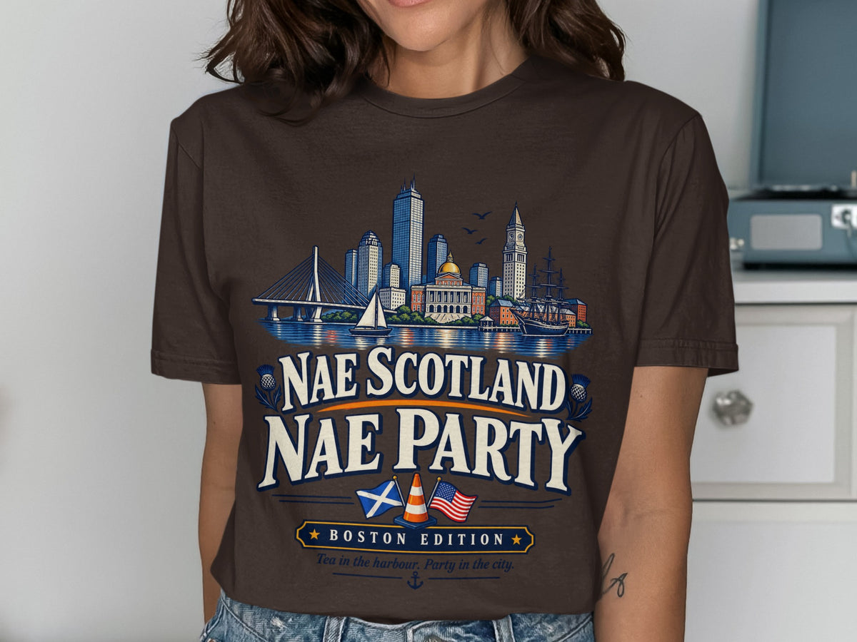 Brown t-shirt with Boston skyline graphic and "Nae Scotland Nae Party Boston Edition" text.