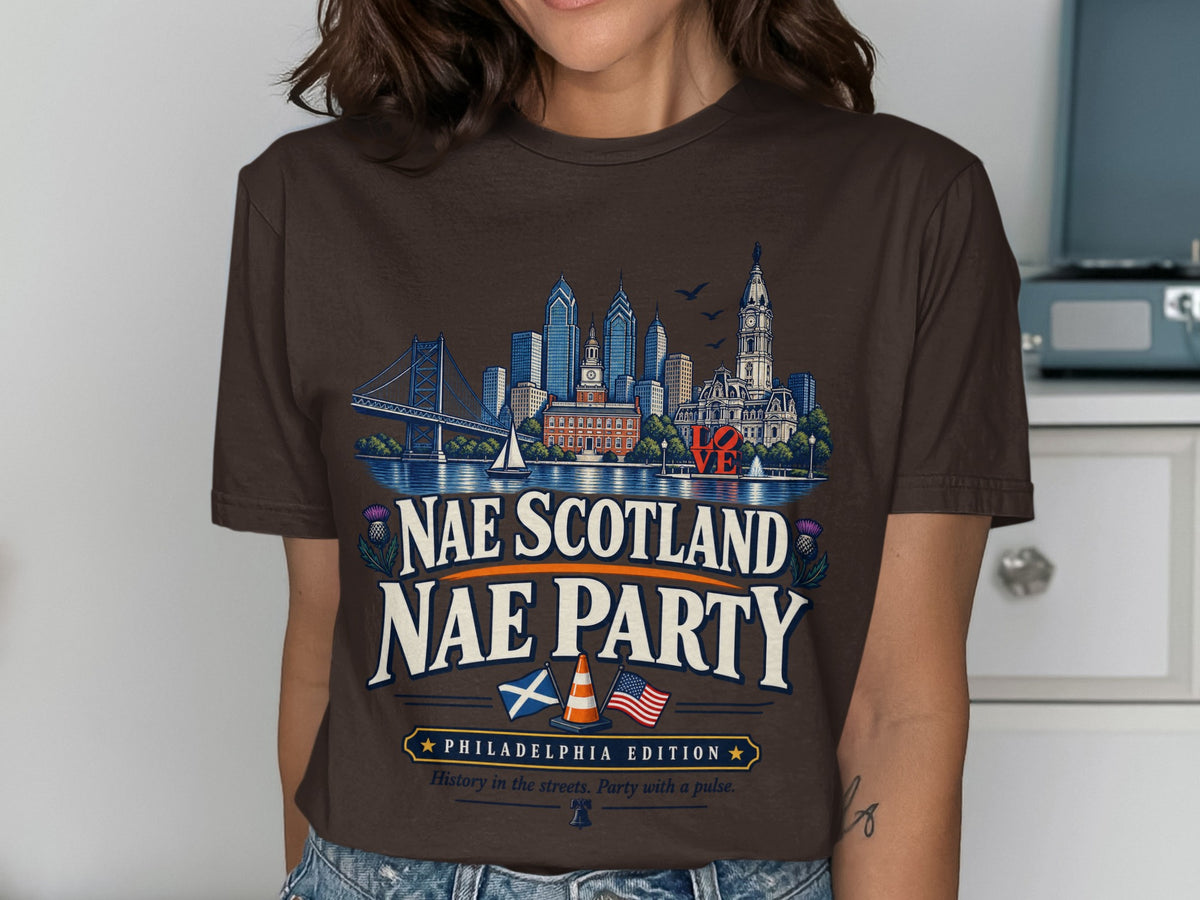 Brown t-shirt with Philadelphia skyline, Scottish and American flags, and "Nae Scotland Nae Party" text.
