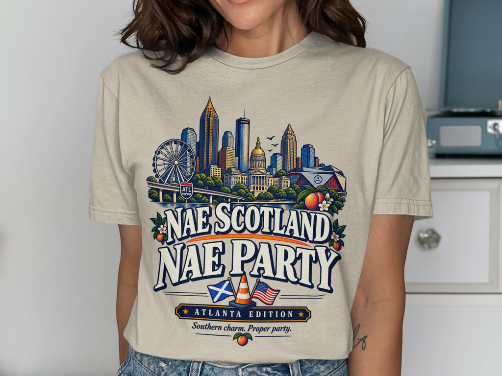 T-shirt graphic with Atlanta skyline, "Nae Scotland Nae Party," and "Atlanta Edition."